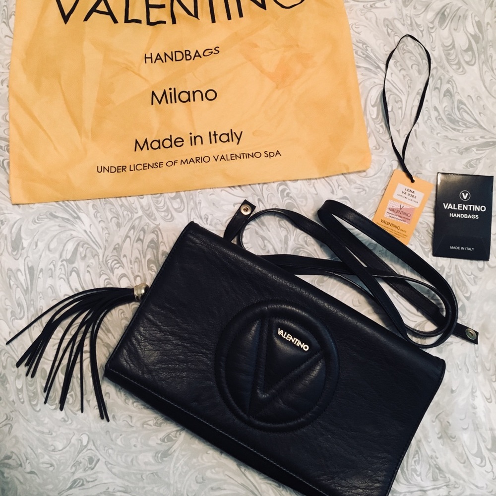 Mario Valentino
Lena Sauvage Leather Clutch Bag